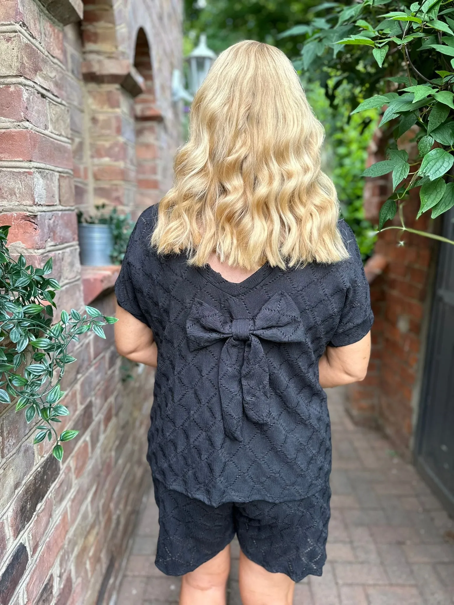 Black Diamond Bow Detail V Neck Top Thalia